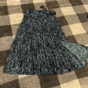 Skies are Blue midi-green skirt with slit. Elastic waist, never worn.